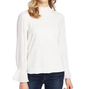 CeCe Pleated Sleeve Mock
Neck Sweater
CeCe
Size: S